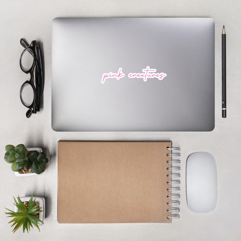 pink creatures title sticker