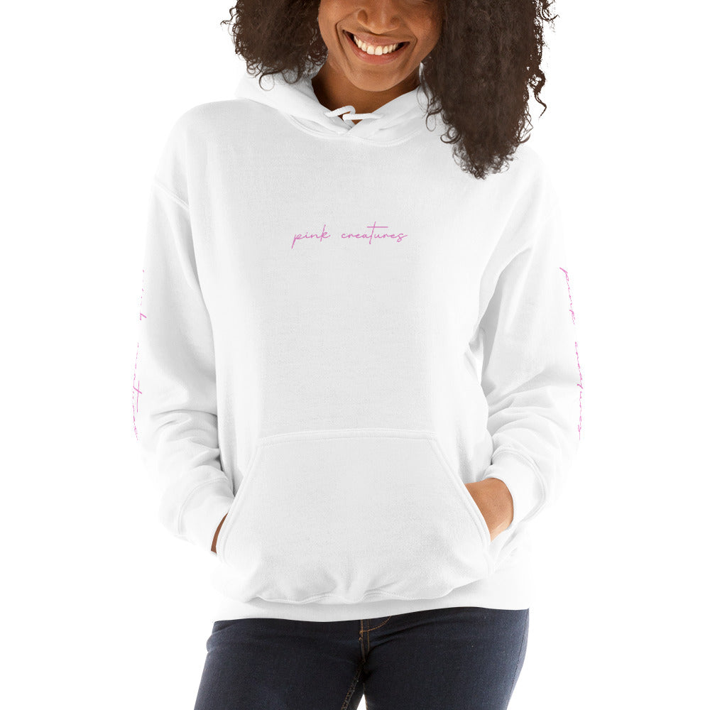 pink creatures title in pink hoodie